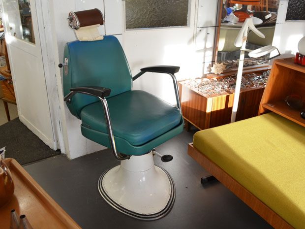 Grüner Friseurstuhl